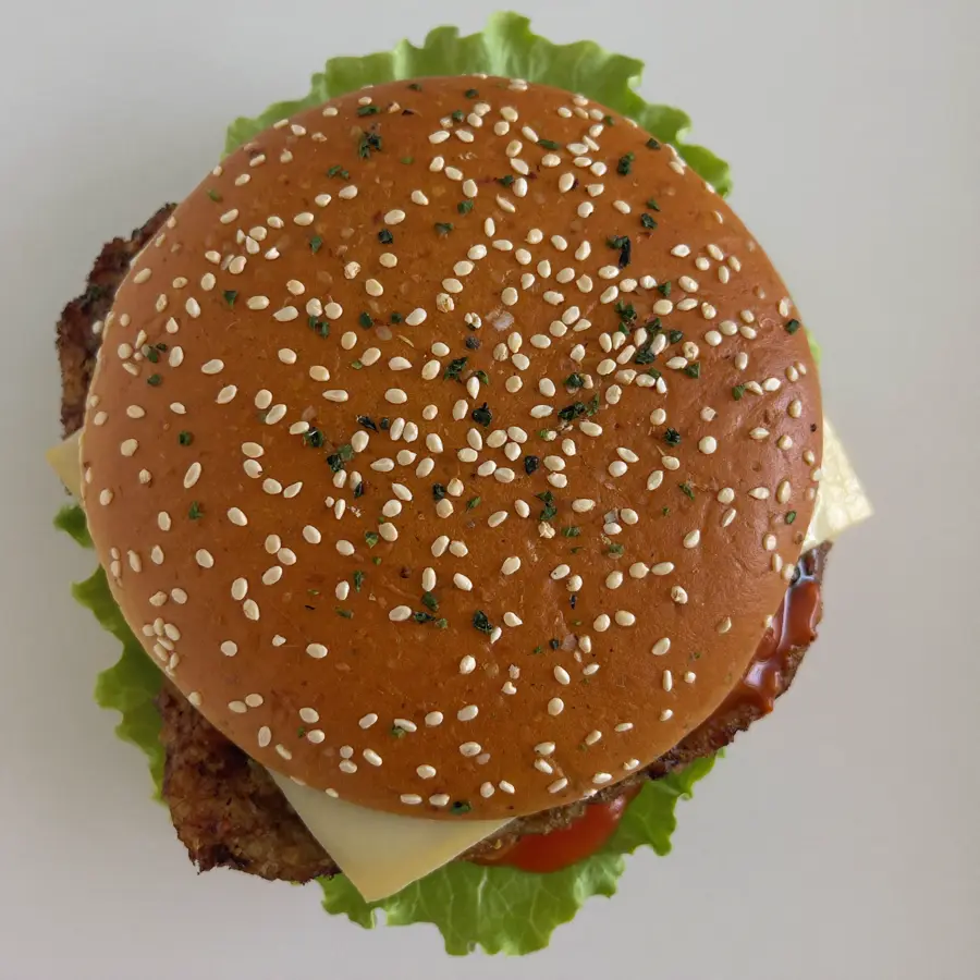 Cheese Crispy & Spicy Paneer Burger (top view) – pure veg from Mohit Bakery