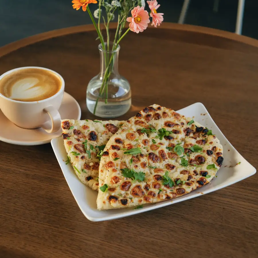 Garlic Naan (served view) – fresh eggless bread from Mohit Bakery