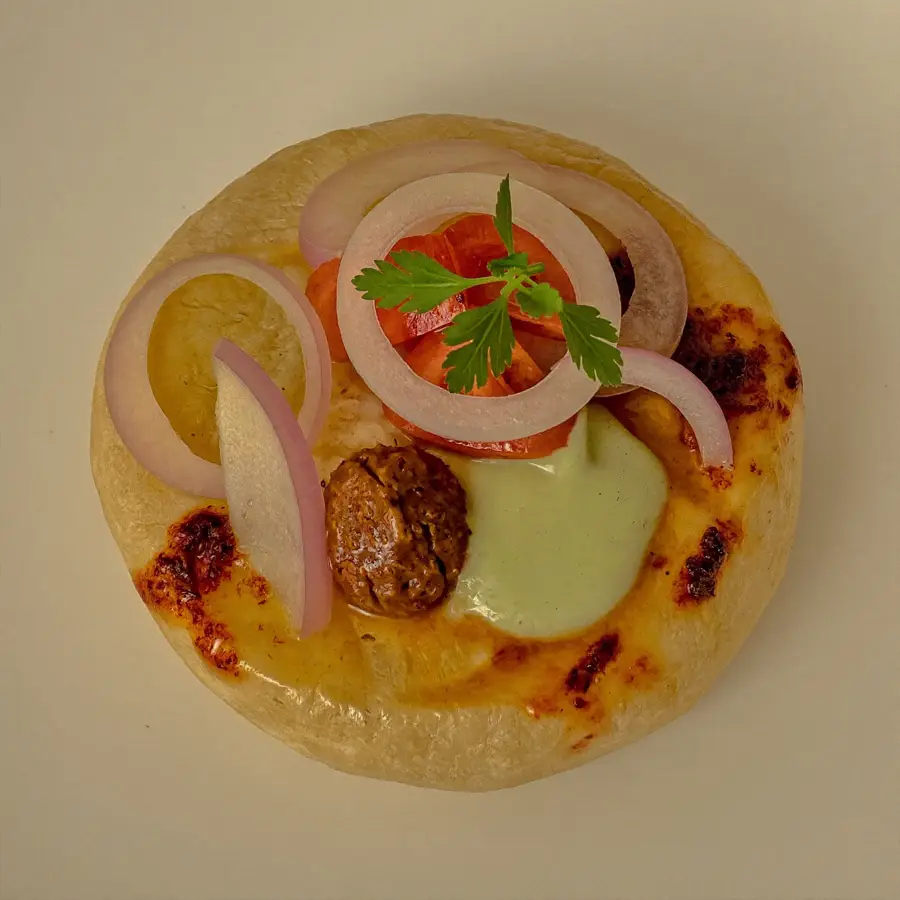 Onion Uttapam (close up view) – pure veg from Mohit Bakery